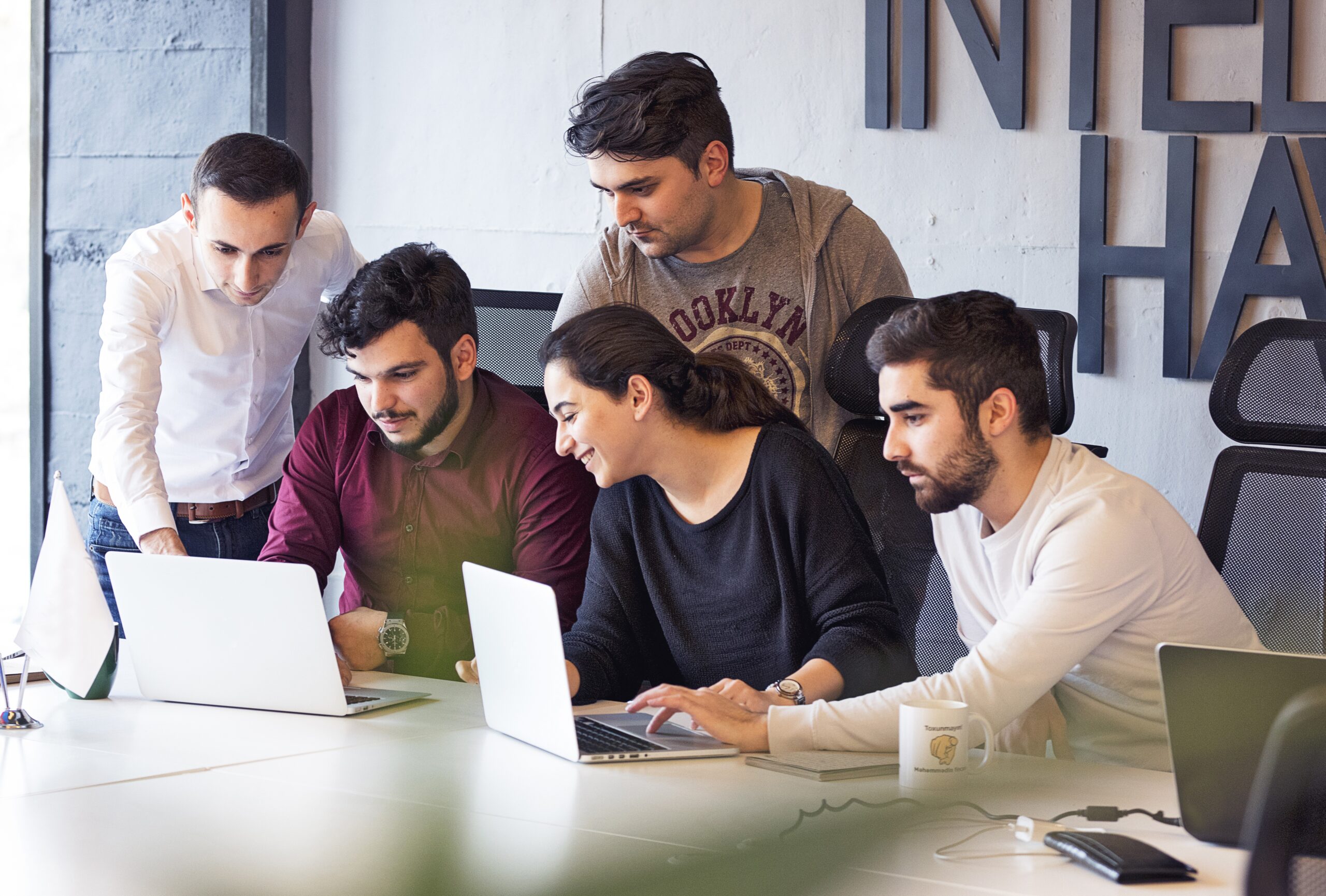 colleagues-working-project-discussing-details